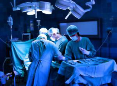 Surgical procedure taking place in a theatre